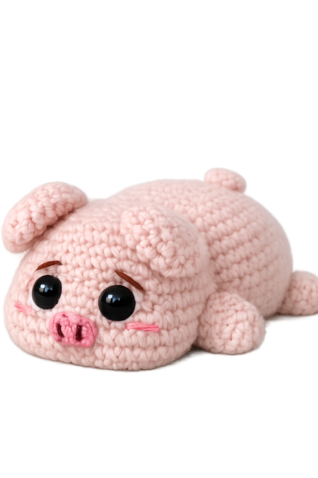 Handmade crochet pig on a neutral background
